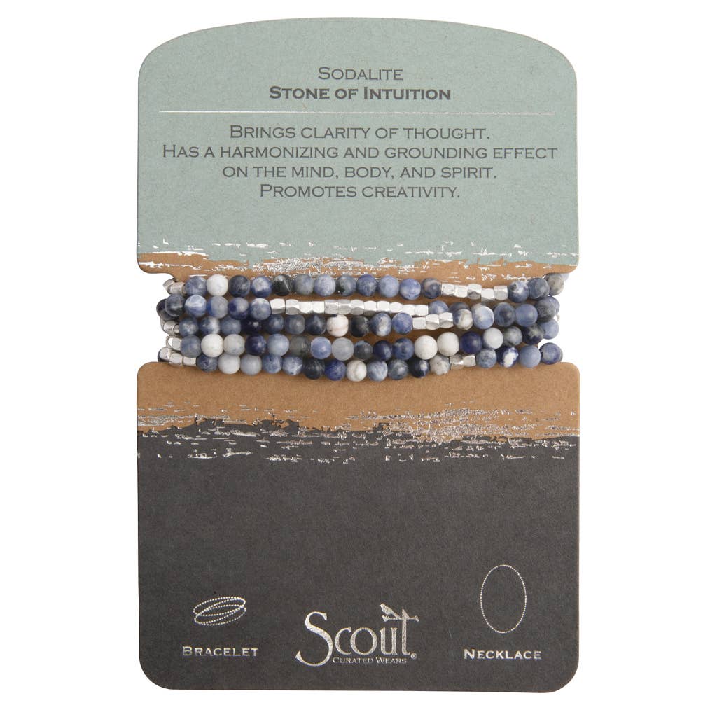 A bracelet made with a combination of sodalite and silver beads, presented on a card with the text 'Sodalite | Stone of Intuition' and the brand 'Scout'.