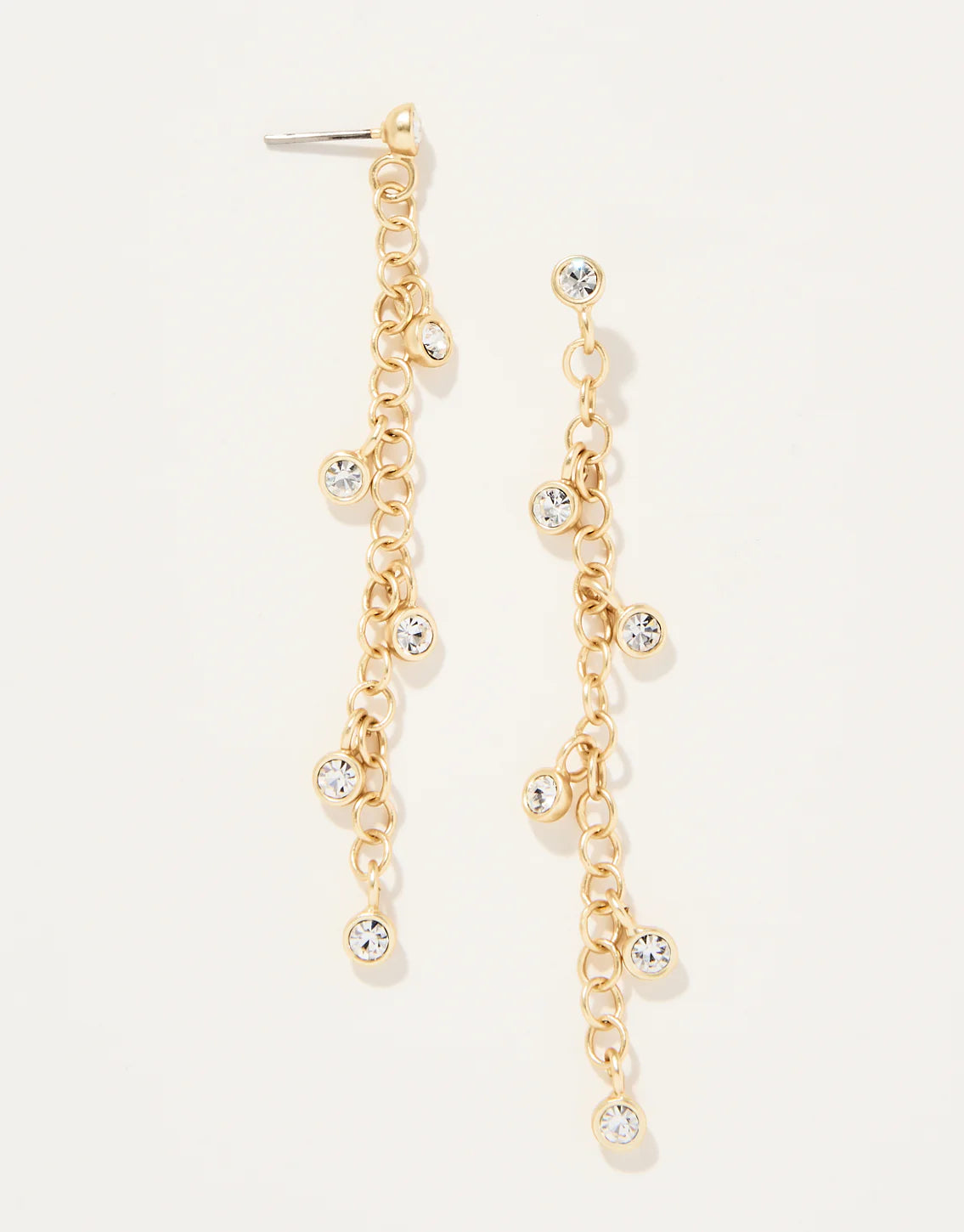 A pair of gold-colored earrings featuring a series of posts with glass crystals attached, designed to dangle and swing.