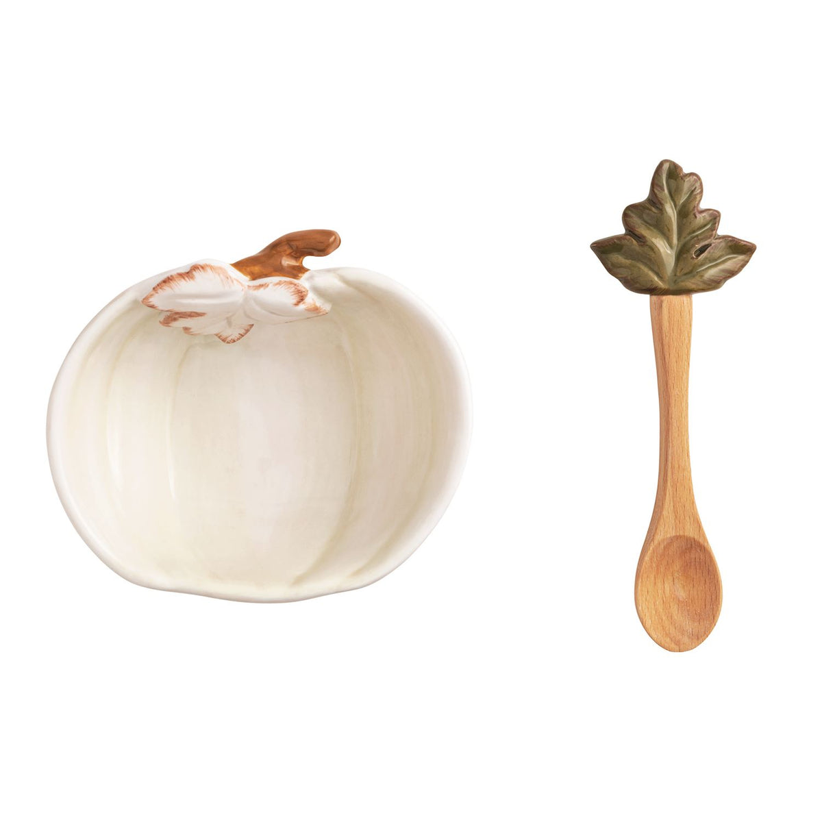 Ceramic pumpkin-shaped dish with wooden spoon on a white background
