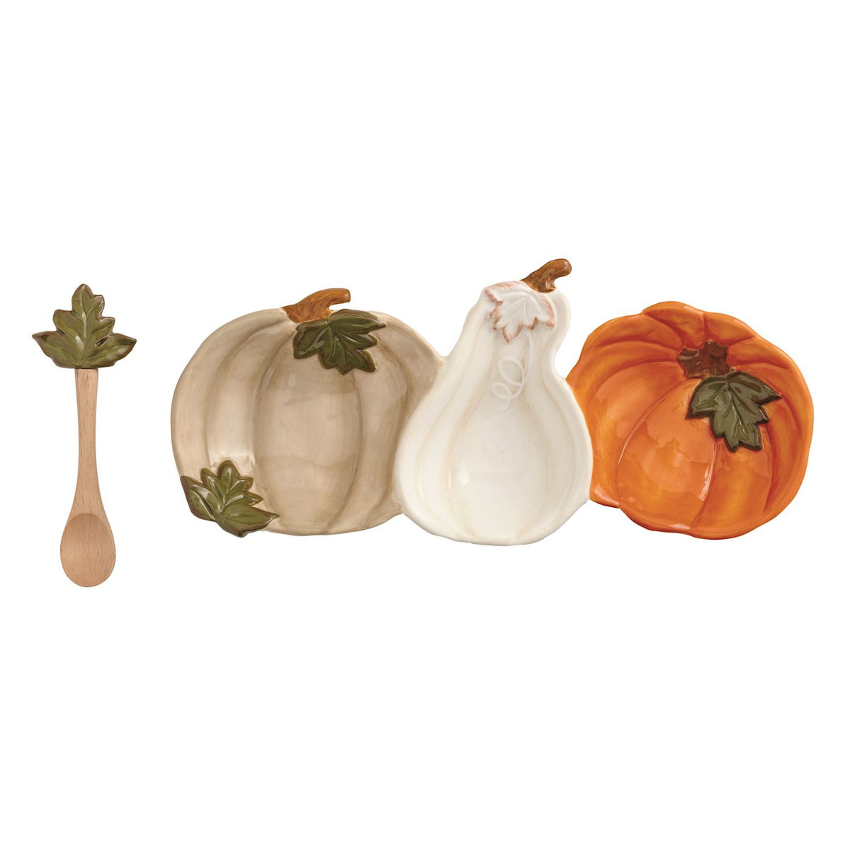 Set of ceramic pumpkins and gourds with a wooden spoon on a white background