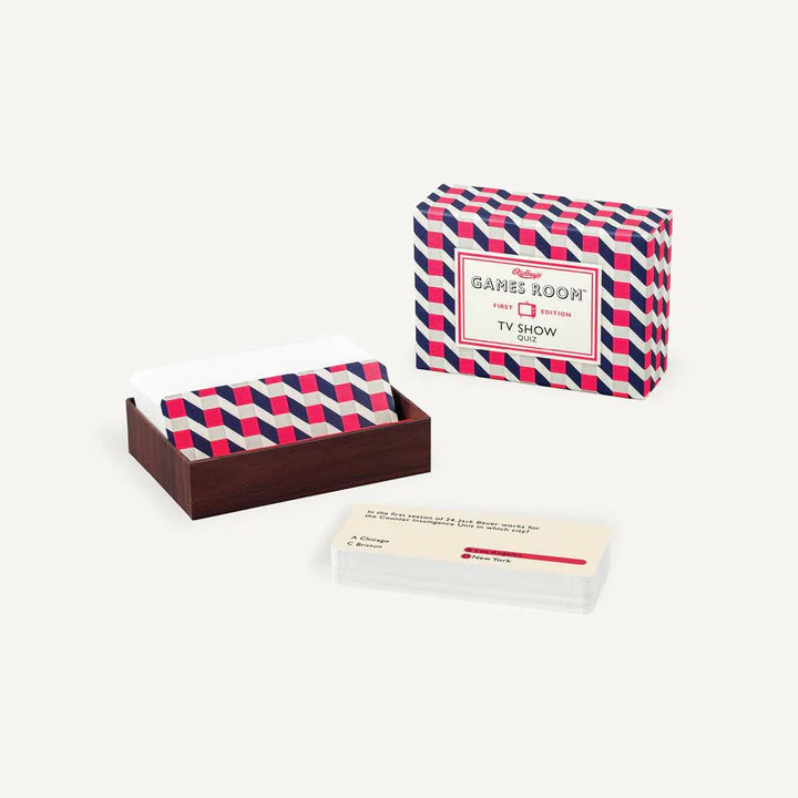 The image shows a trivia game set titled 'TV Show' from Games Room, including a stylish geometric print box, a set of question cards, and an instruction card.