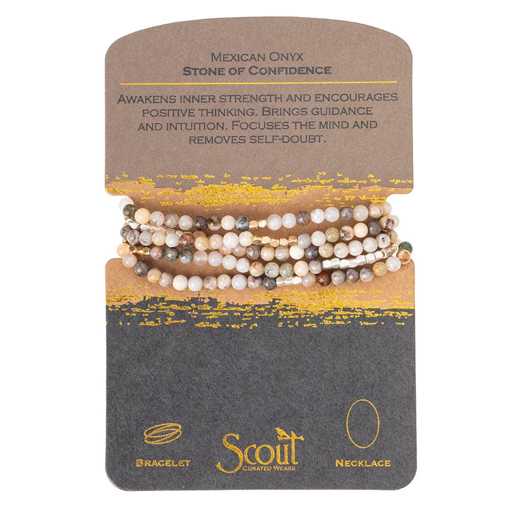 A bracelet made with a combination of beads, including semi-precious stone beads and plated brass, displayed on a card with text describing it as a 'Mexican Onyx, Stone of Confidence' and mentioning that it can be worn as a bracelet or necklace.