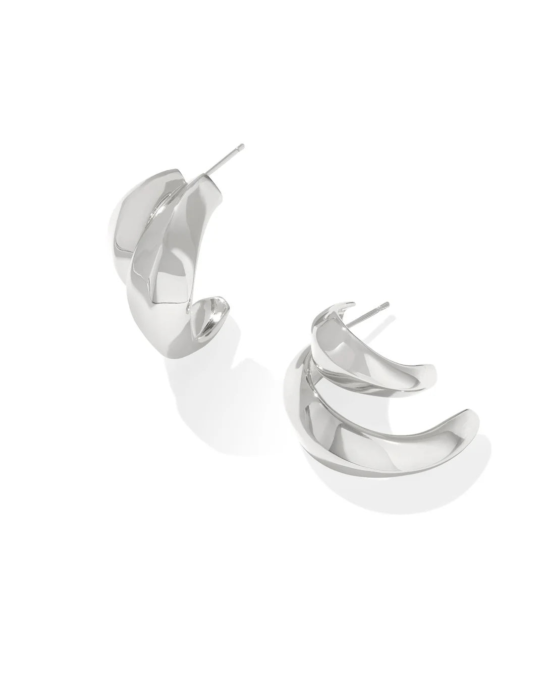 A pair of silver-colored double hoop earrings with a rhodium over brass closure.