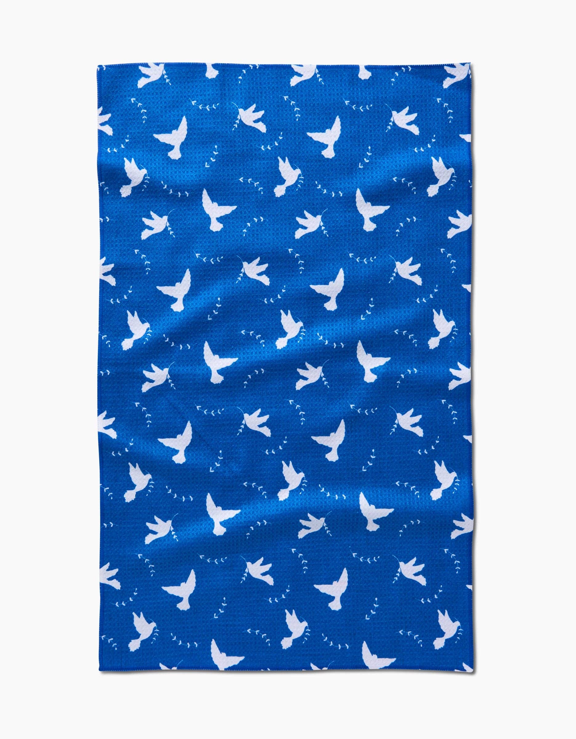 blue towel with white dove peace pattern