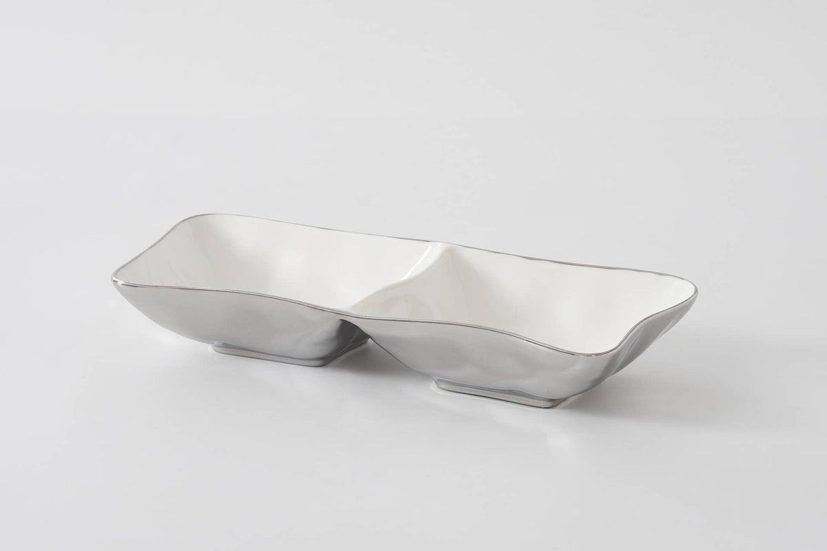 Silver bowl with a unique design on a white background