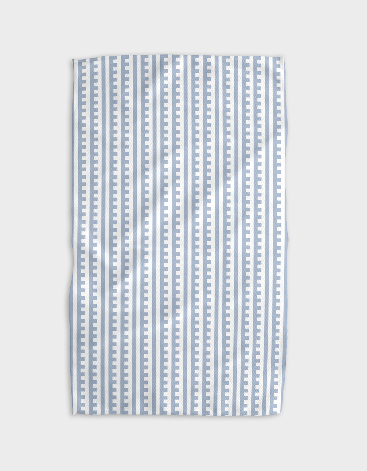A blue and white striped tea towel with a solid pattern and a hang loop.