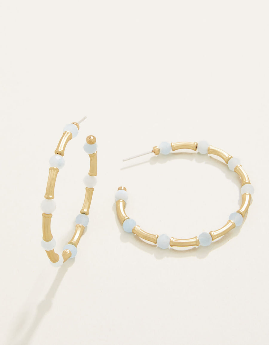 gold earrings with mother of pearl beads