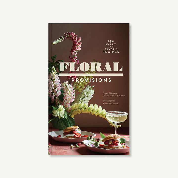 A cookbook cover for 'Floral Provisions' featuring images of edible flowers and dishes prepared with floral ingredients.