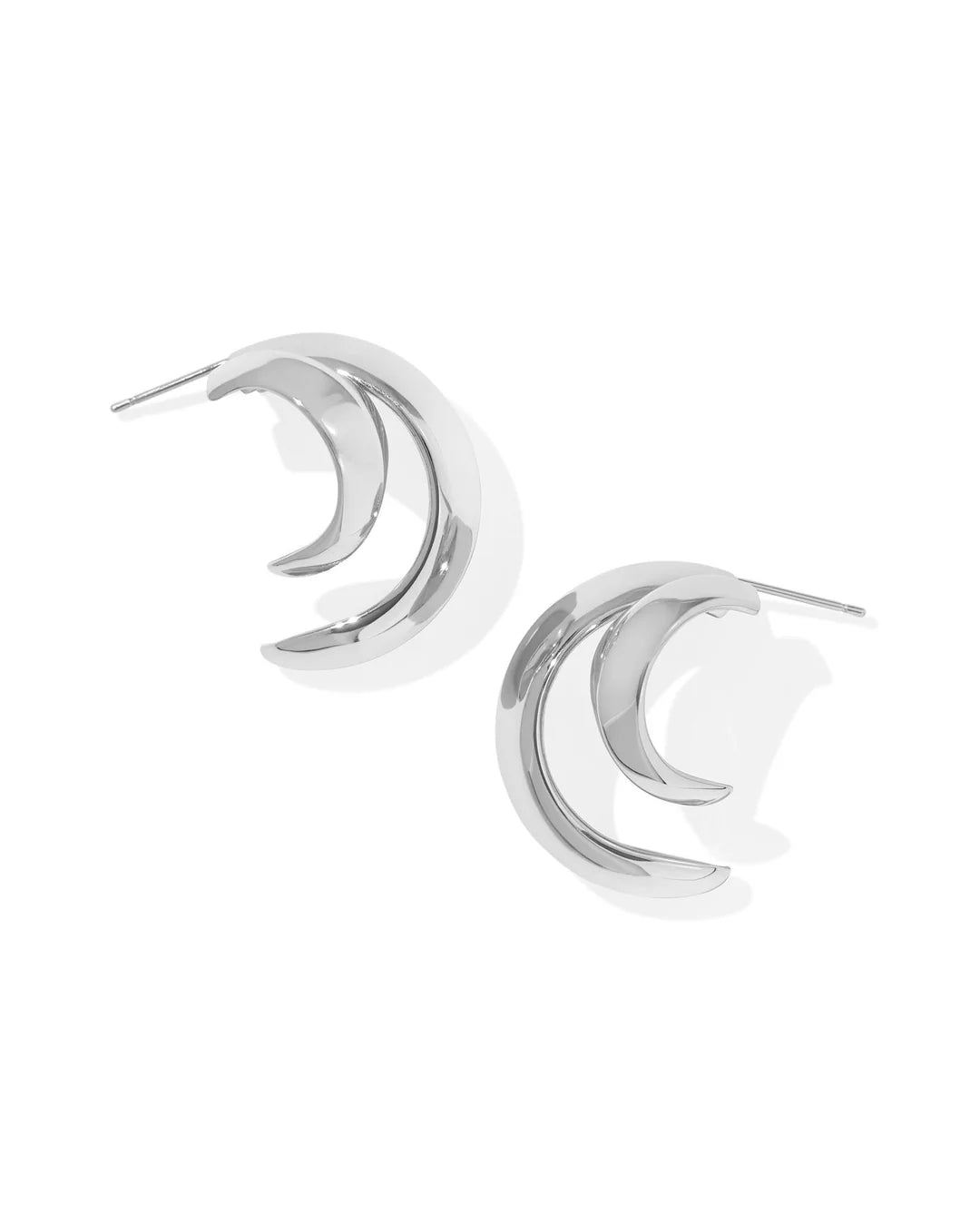 silver double hoop earrings against a white background