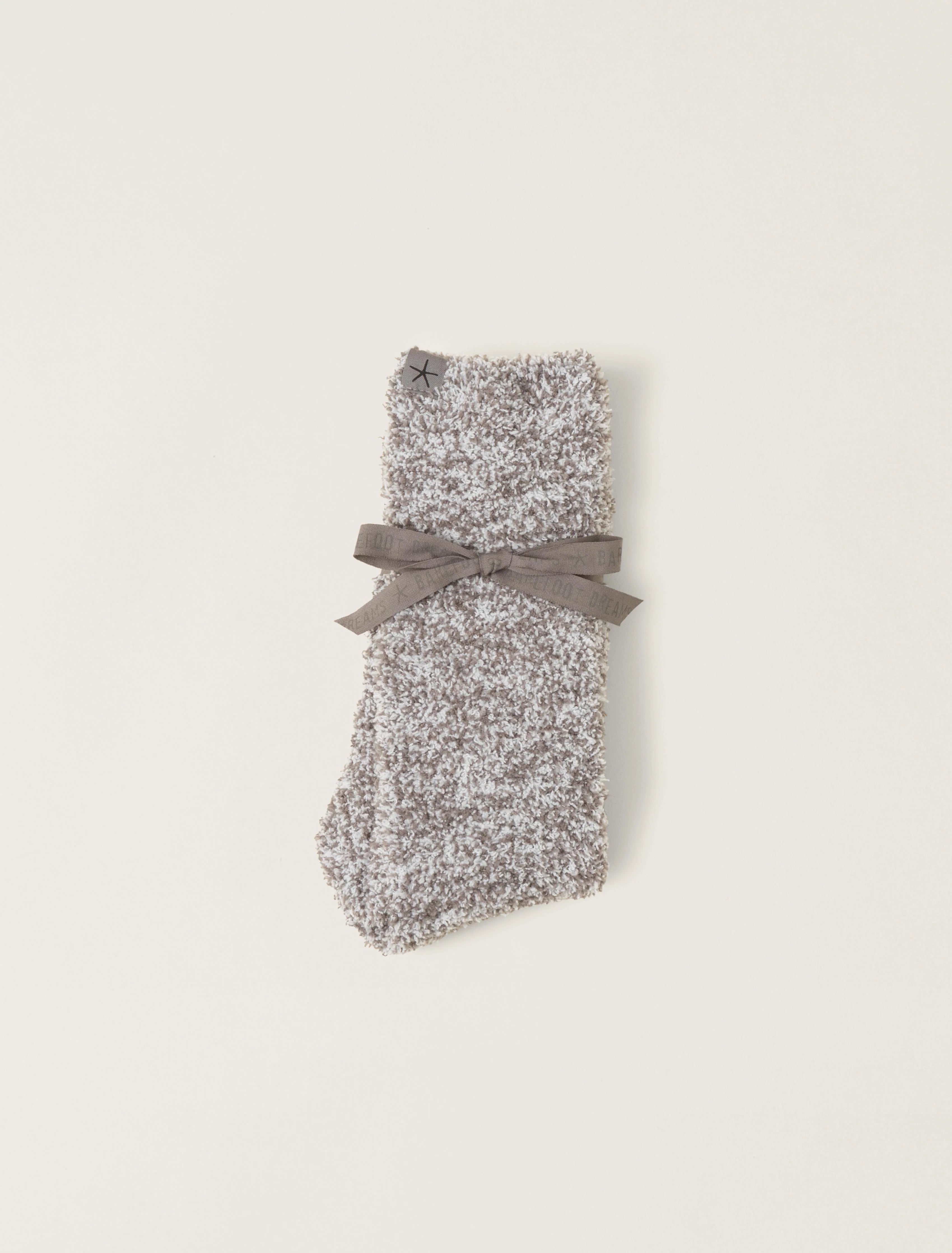 A pair of heathered charcoal socks with a bow detail, laid out on a plain background.