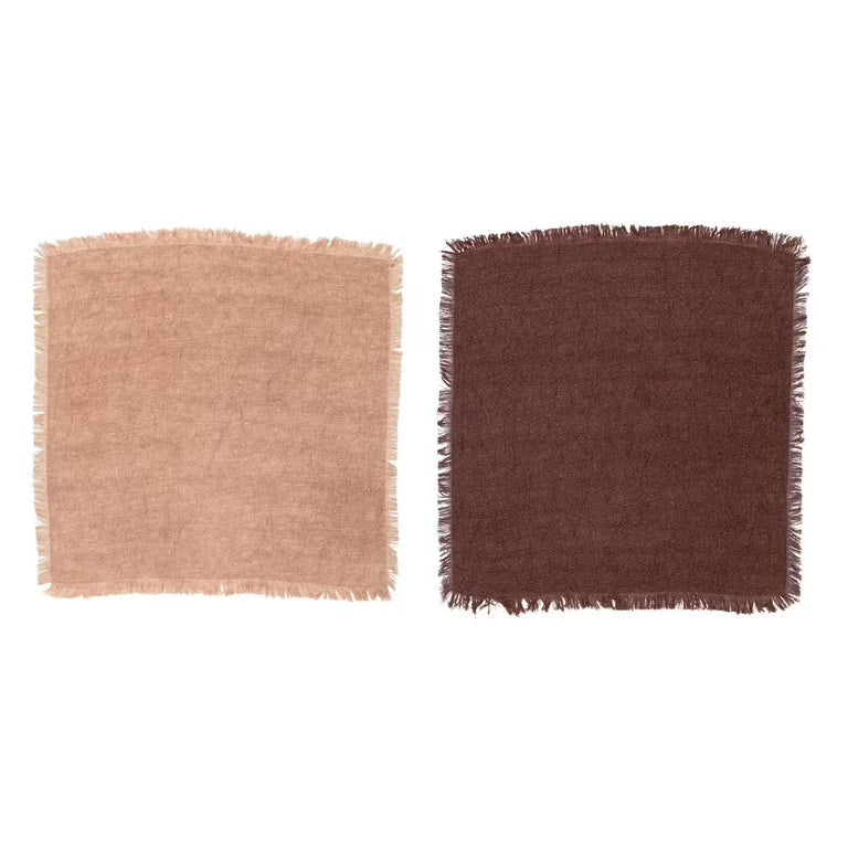 Two square fabric samples, one beige and one brown, on a white background.