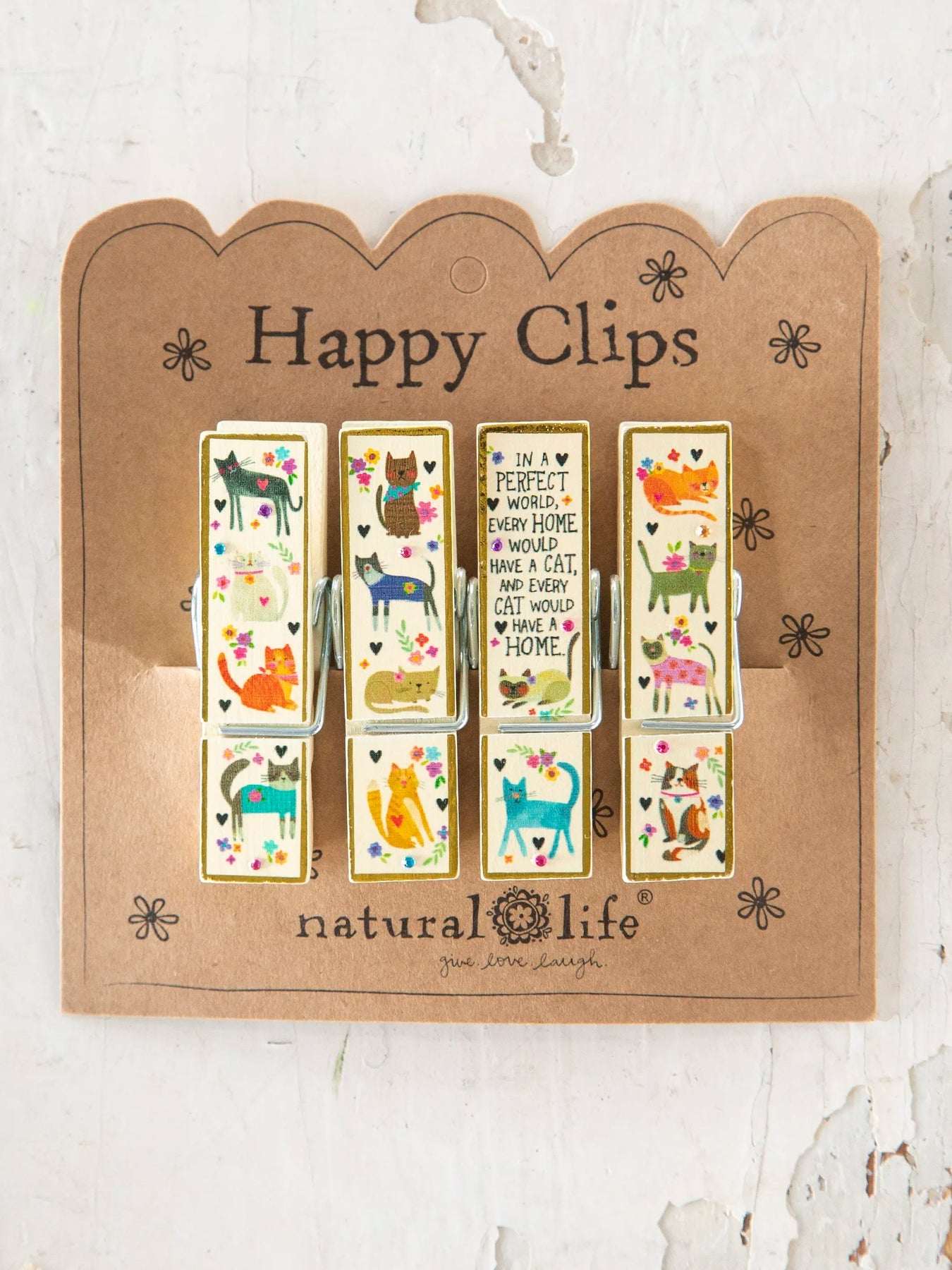 Happy Clips packaging with illustrations of animals on a cardboard backing.