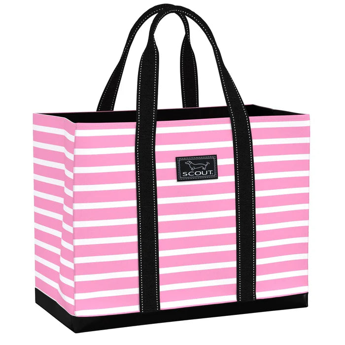 Pink and white striped tote bag with black handles and trim on a white background