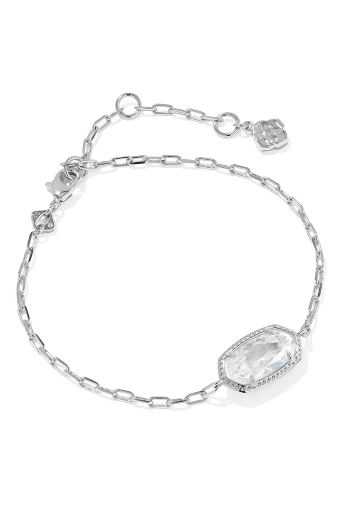 Silver bracelet with a clear gemstone on a white background