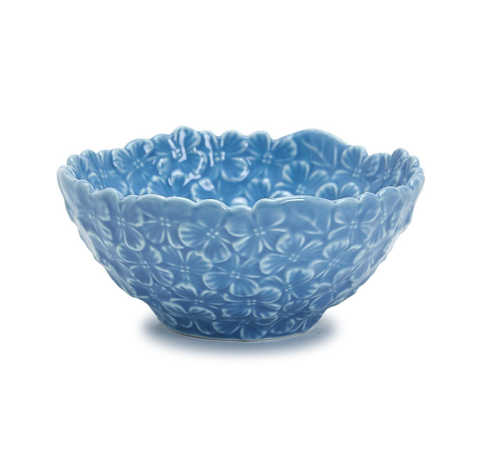 A blue porcelain bowl with a hydrangea flower shape design.
