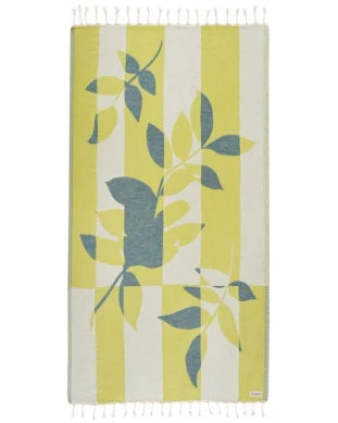 Textile with leaf pattern on a yellow and white background