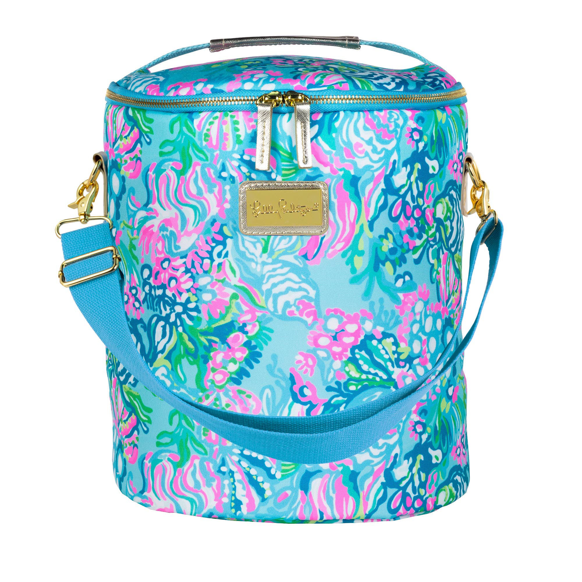 A colorful beach cooler with a floral pattern, featuring a top handle and an adjustable strap with gold logo plaque.