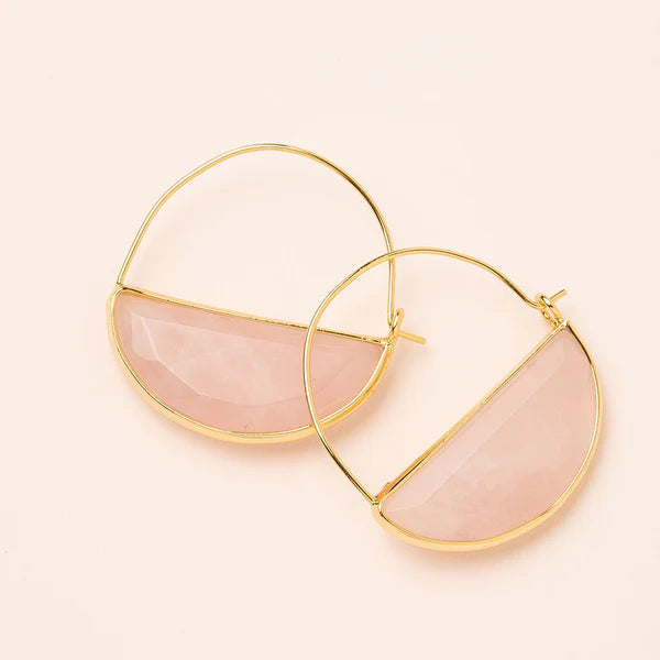 A pair of gold hoop earrings with rose quartz semi-precious stones.