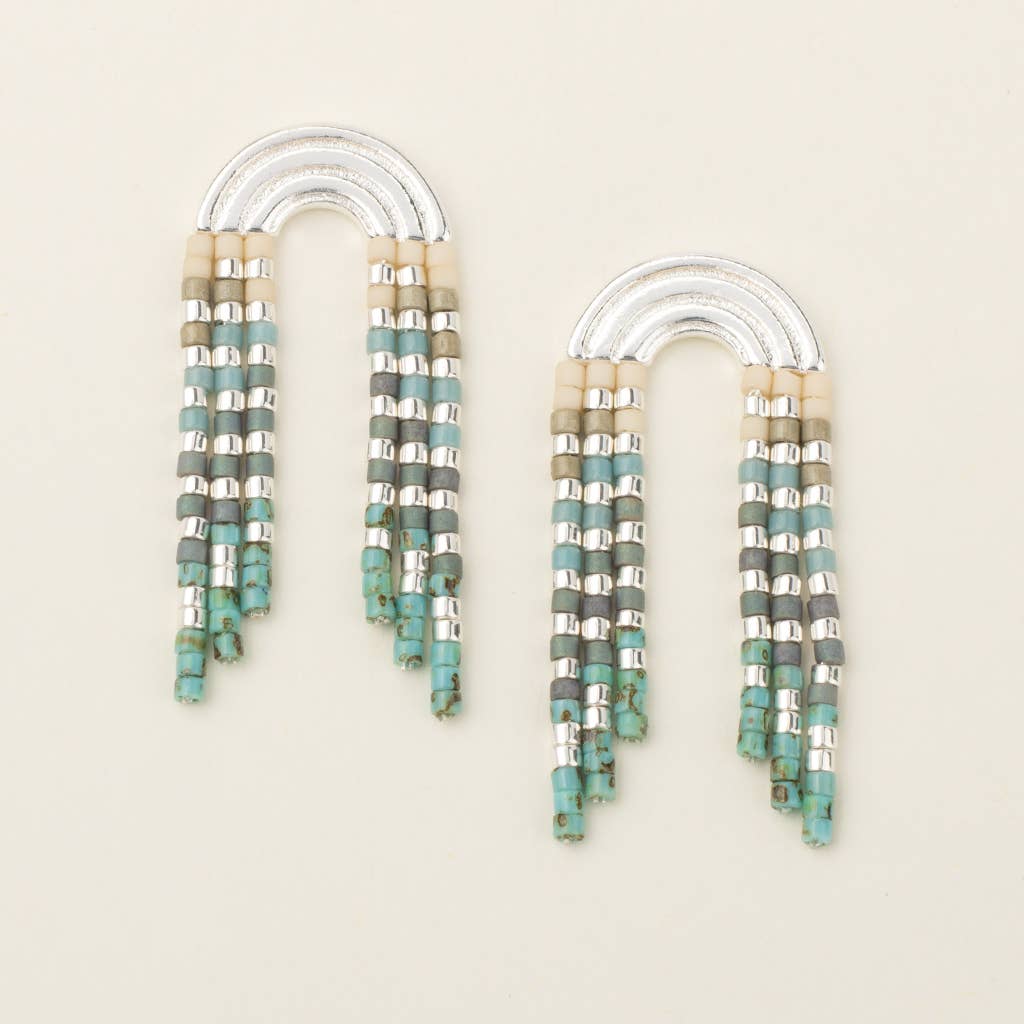 A pair of turquoise and multicolor beaded fringe earrings with silver metalwork.