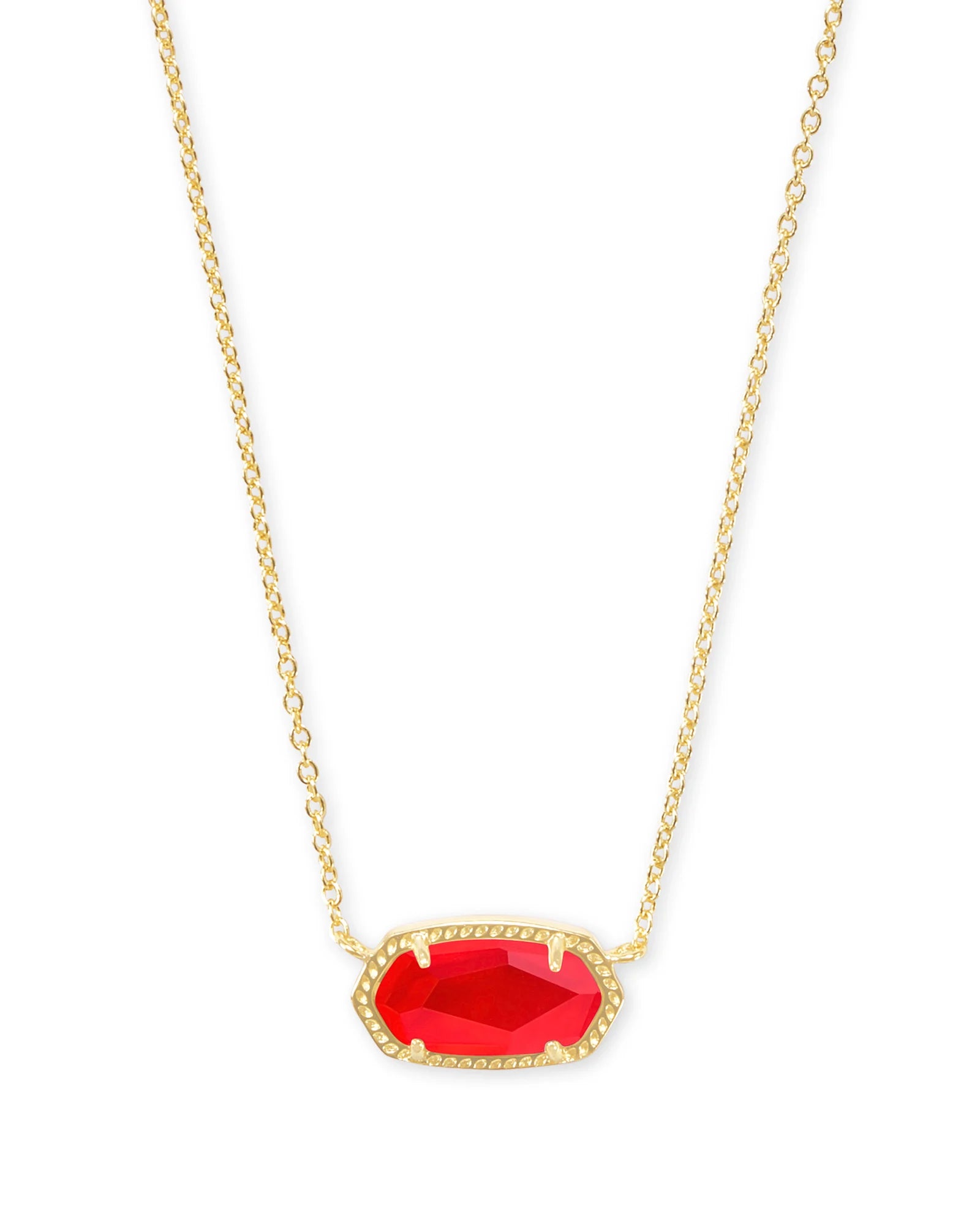 gold necklace with red gemstone pendant