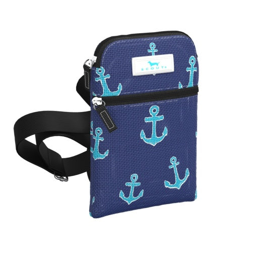 A blue crossbody bag with a pattern of anchors, featuring a main zipper compartment and a smaller front zipper pocket, with a removable adjustable strap.