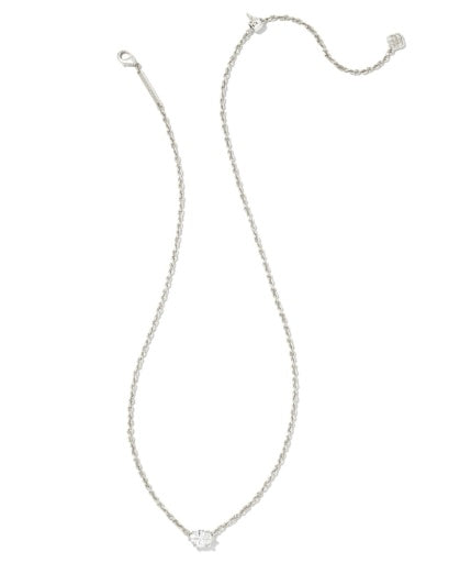 Silver necklace with a small pendant on a white background