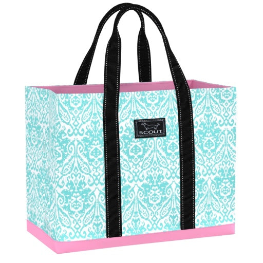 bag with green pattern and pink bottom with black straps
