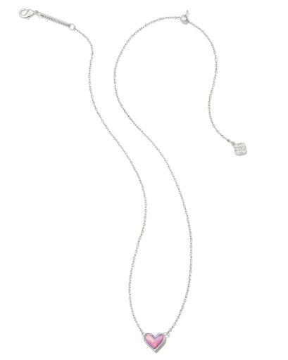 Necklace with a pink heart pendant on a white background