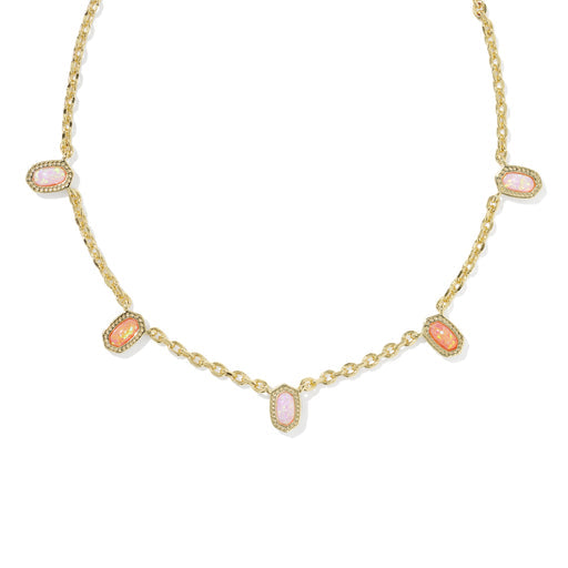 gold necklace with pink gemstone pendants against a white background