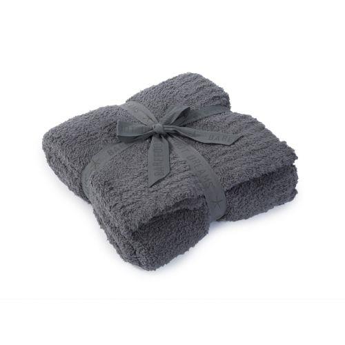 Gray blanket folded on a white background