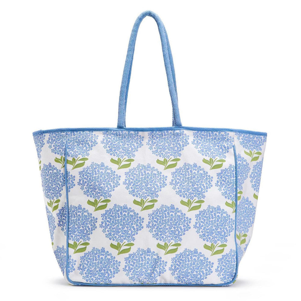 Tote bag with blue floral pattern on a white background