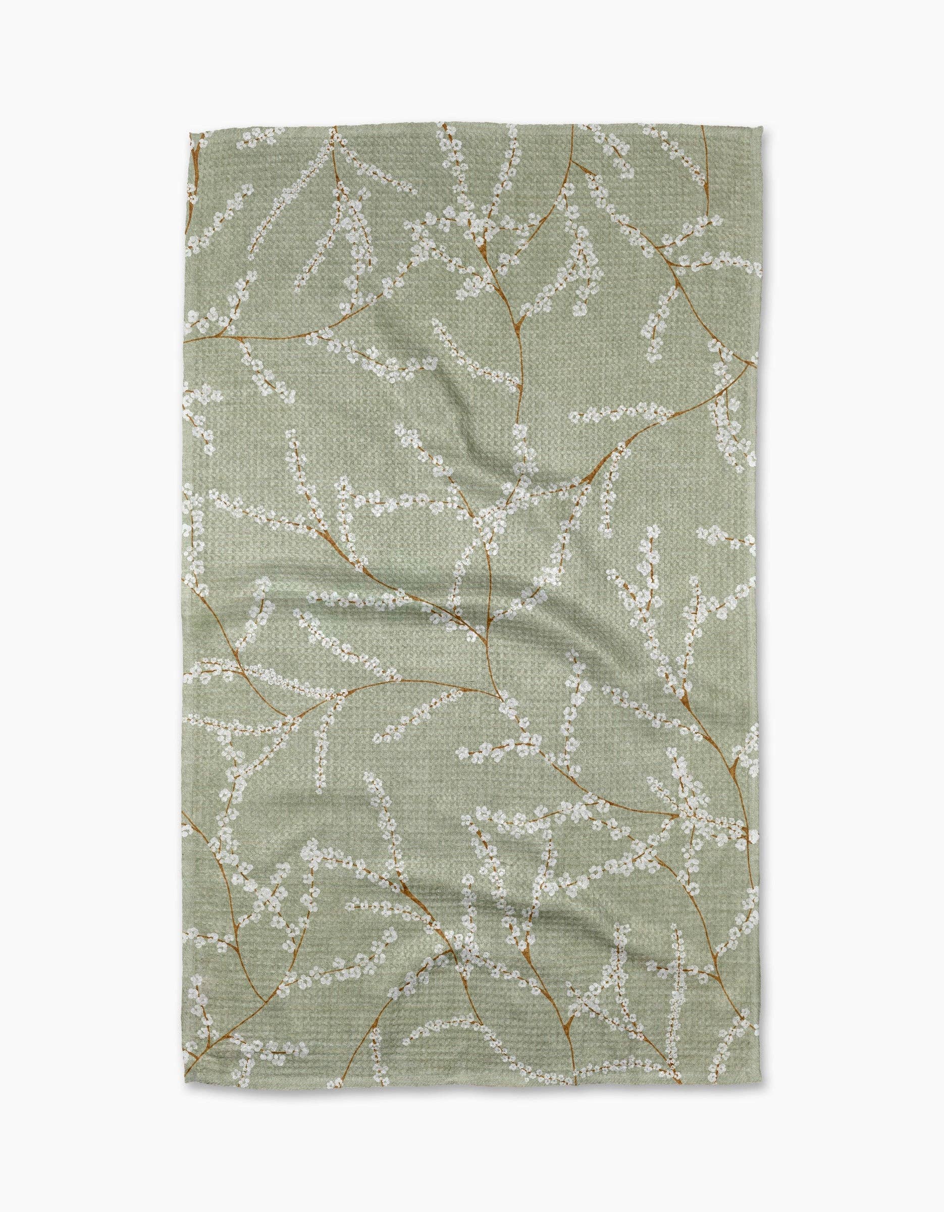 Fabric with floral pattern on a green background