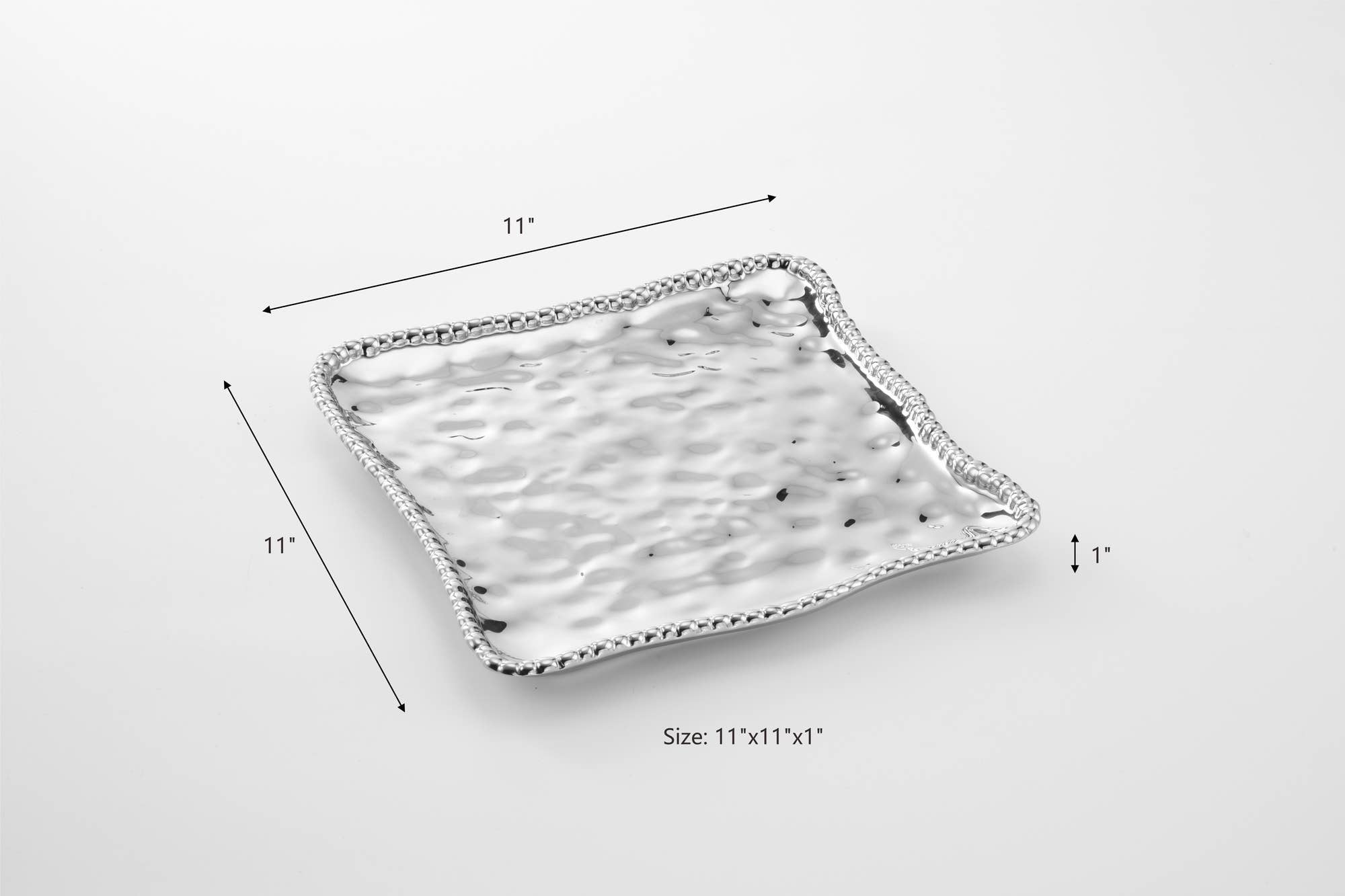 Rectangular ceramic tray with textured surface and measurements on a white background