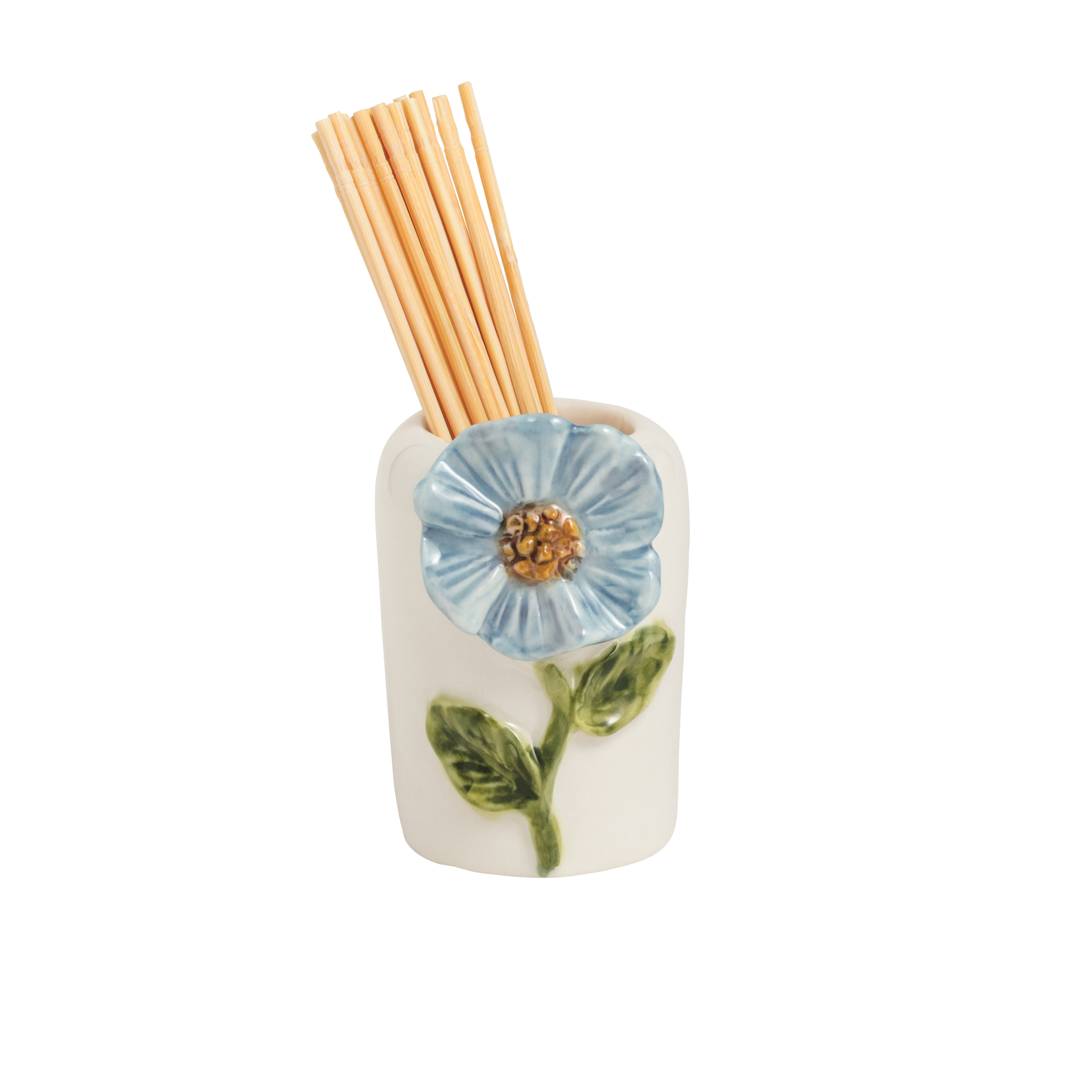 Ceramic diffuser with floral design and wooden sticks on a white background