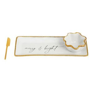 Decorative tray with a small bowl and gold accents on a white background