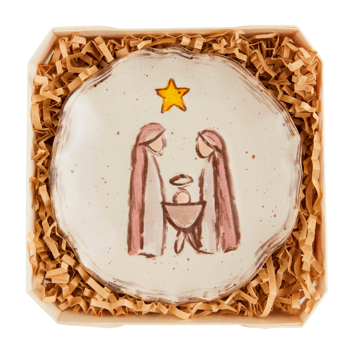 Decorative plate with a nativity scene design in a box