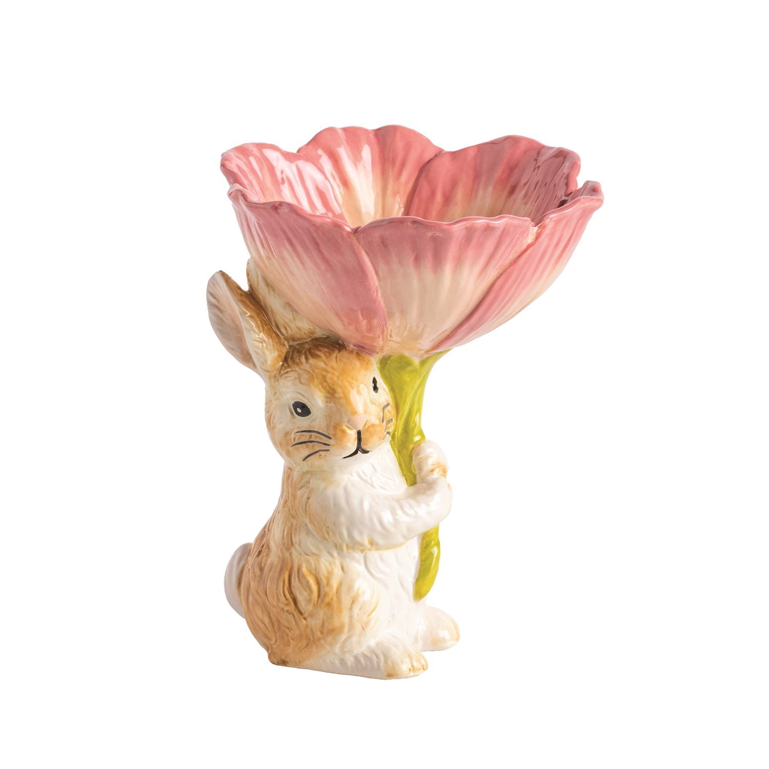 Ceramic rabbit holding a pink flower on a white background