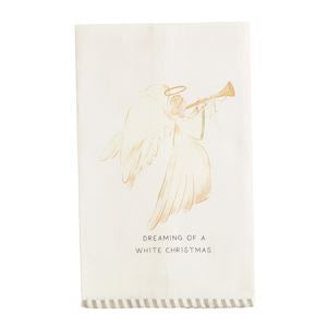 An off-white tea towel featuring a gold foil illustration of an angel playing a trumpet, with the text 'DREAMING OF A WHITE CHRISTMAS' printed below. The towel is shown flat against a clean white background.