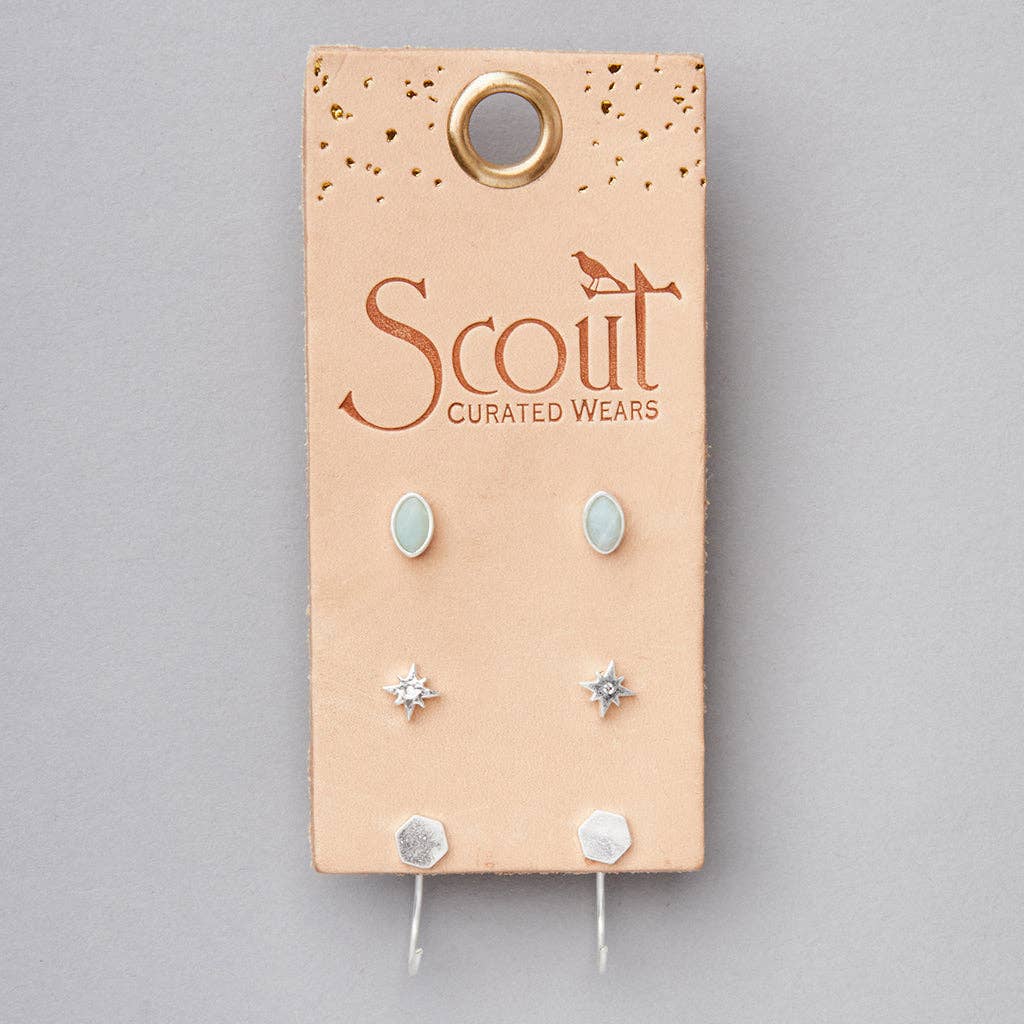 A card with three silver-colored stud earrings displayed on it, with the brand name 'Scout Crafted Wears' printed at the top.