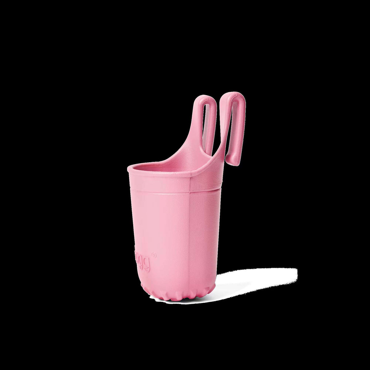 Pink plastic beverage holder on a white background