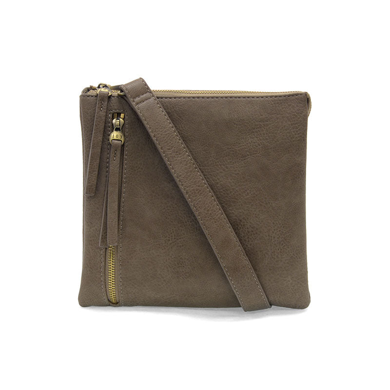 Brown leather crossbody bag with gold zipper on a white background
