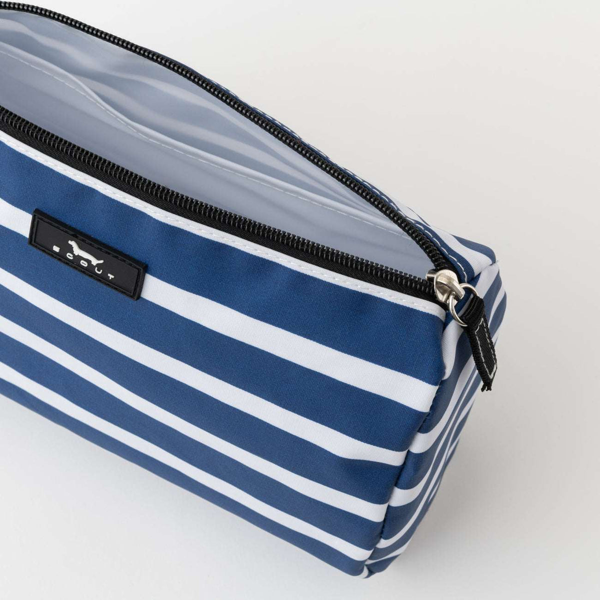Blue and white striped pouch with a zipper on a light gray background