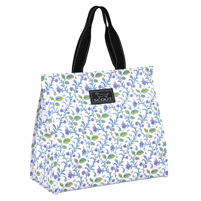 A floral patterned tote bag with black straps and a label in the front.