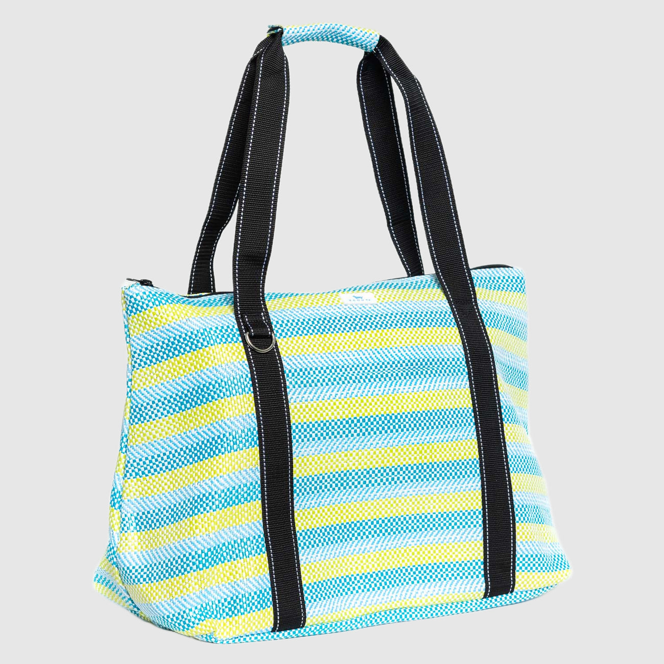 Striped tote bag with black handles on a light gray background