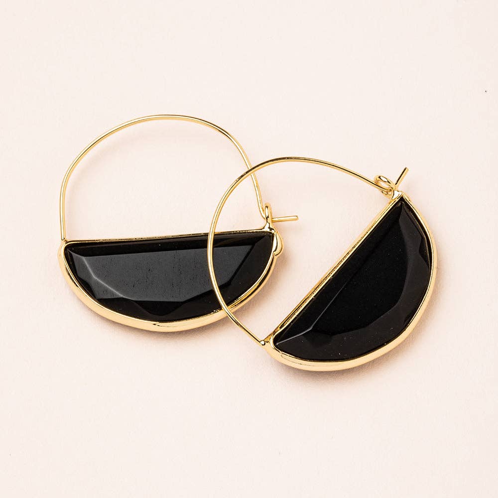 A pair of hoop earrings with a black spinel stone set in a semi-circle shape, with the rest of the hoop in gold color.