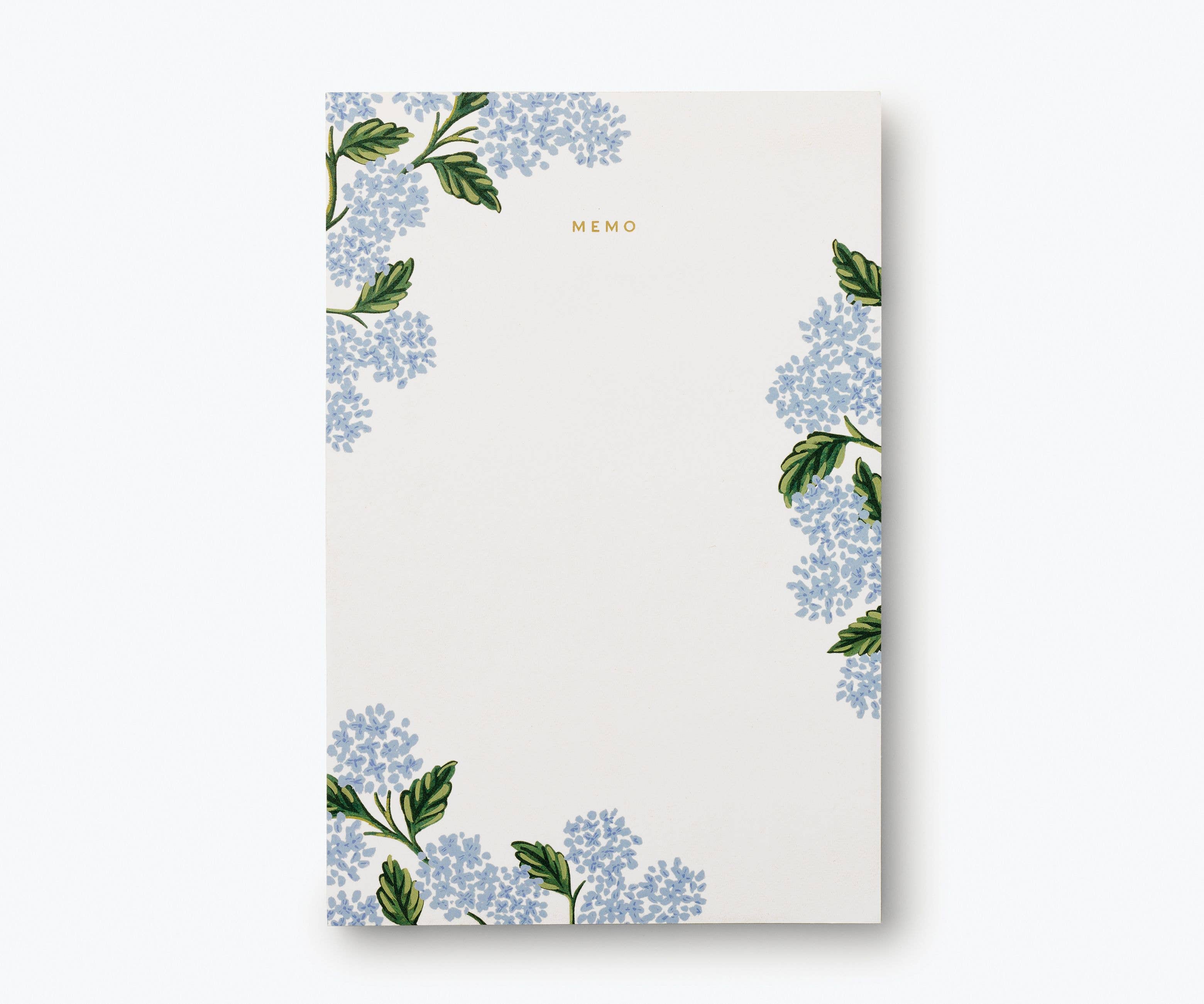 Notepad with floral design on a white background