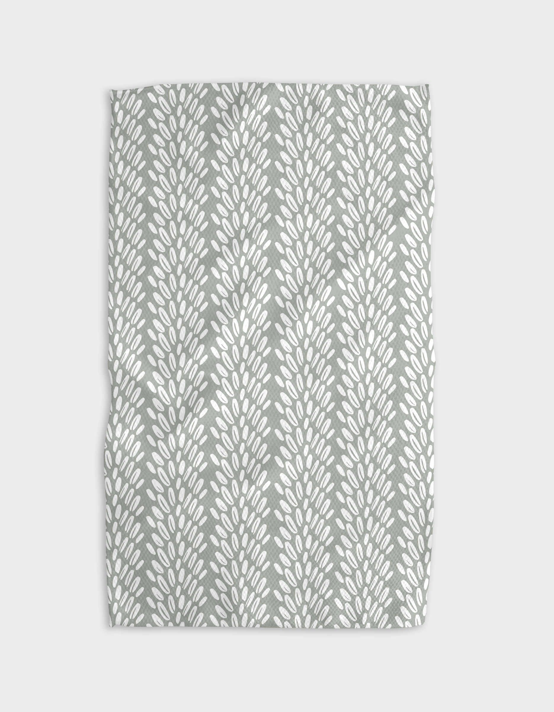 A gray tea towel with a geometric pattern of interlinked circles displayed on a white background.