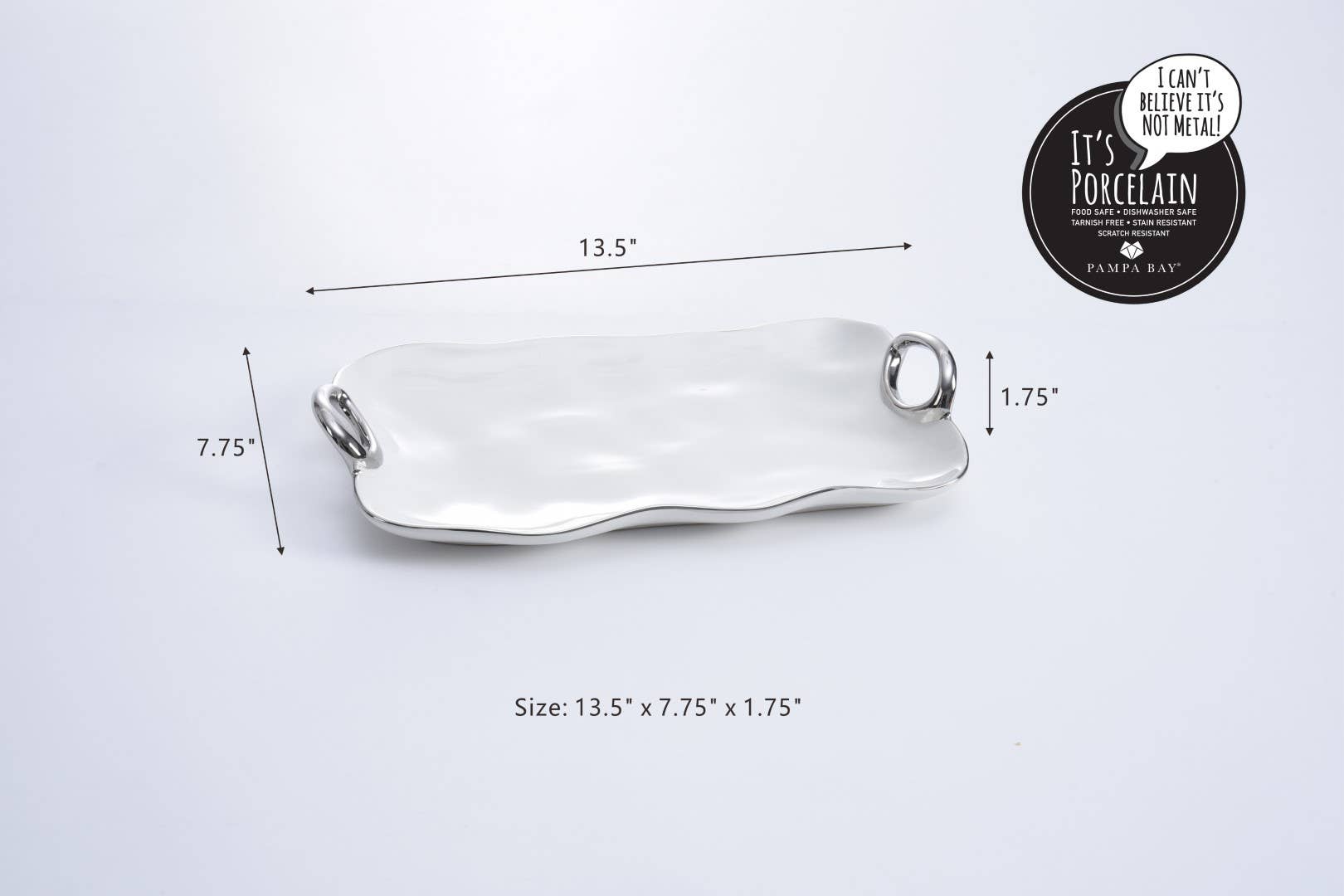 White ceramic tray with handles on a light gray background, showing measurements and brand name.