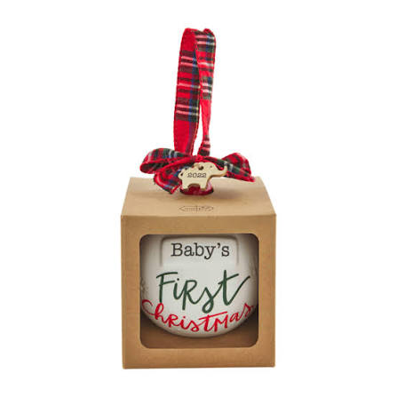 baby's first christmas ceramic ornament with box and ribbon against white background