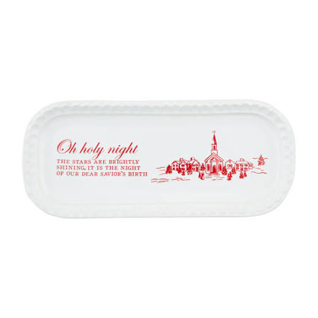 white ceramic plate with red details against a white background
